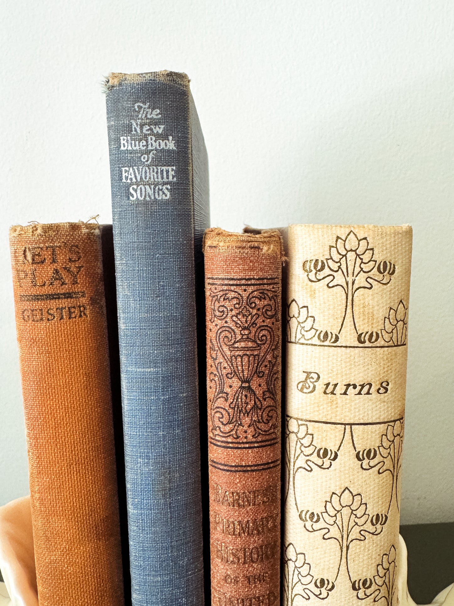 Wings & Words — Vintage Ceramic Dove Bookends with Four Antique Books