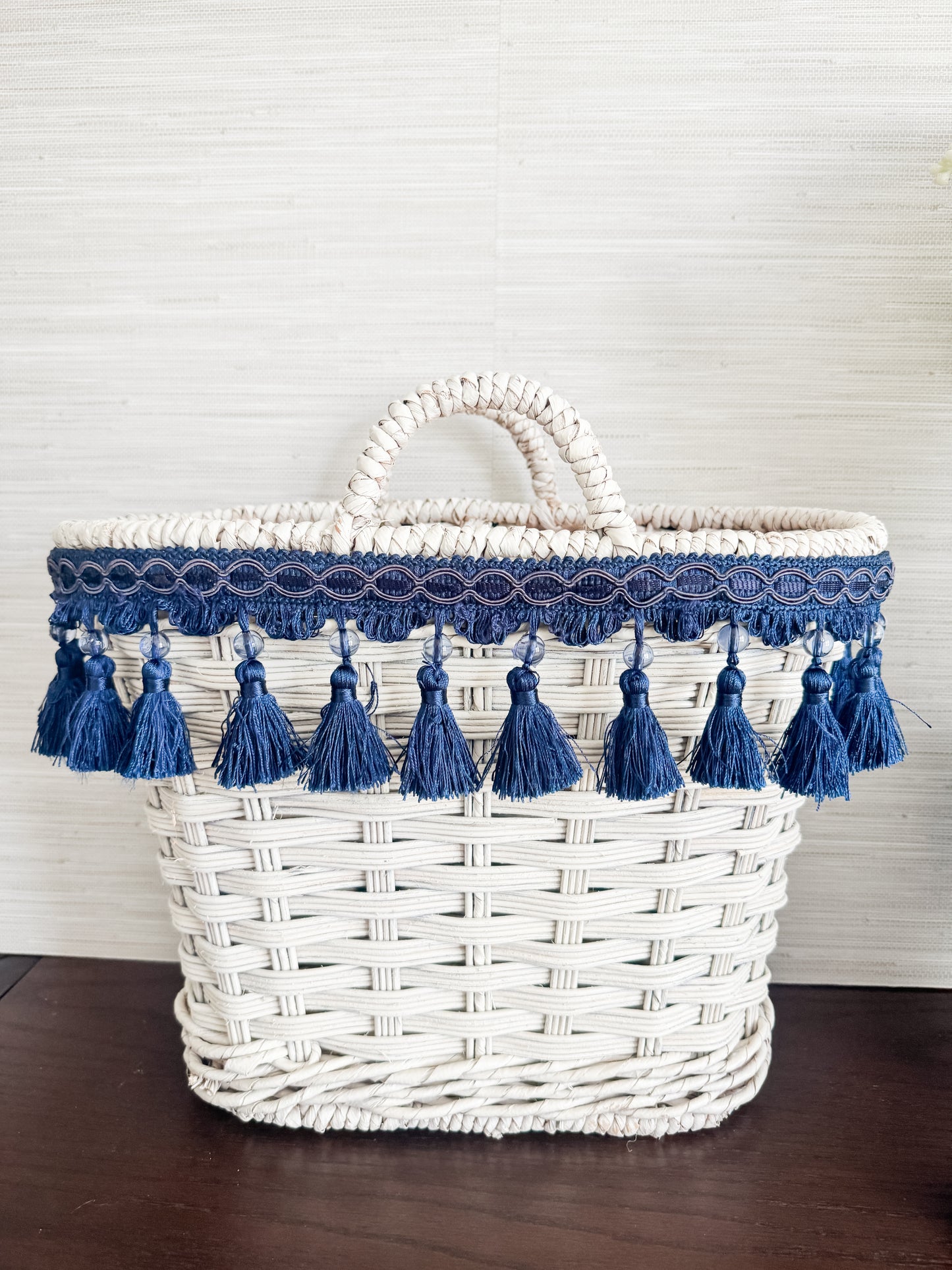 The Riviera — White Wicker Tote with Navy Tassel Trim
