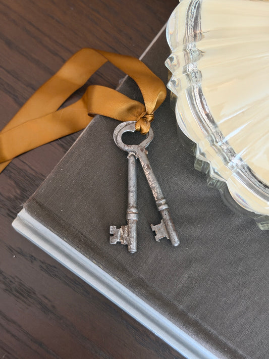 The Keep — Pair of Antique Skeleton Keys on Gold Ribbon